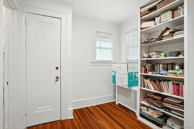 a view of room with racks on the wall