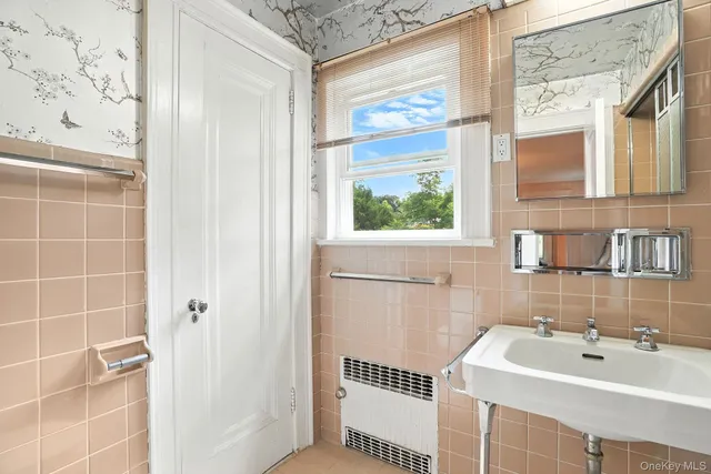 a bathroom with a sink and a toilet