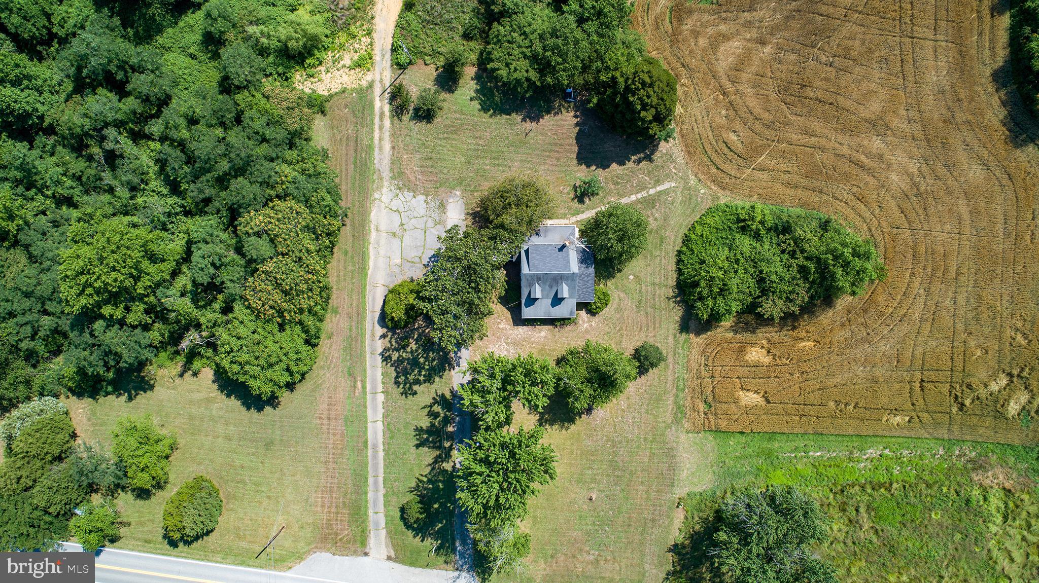 9145 Mackall Road St. Leonard, MD 20685 - Photo 2 of 48 Land extends on both sides of home & back.