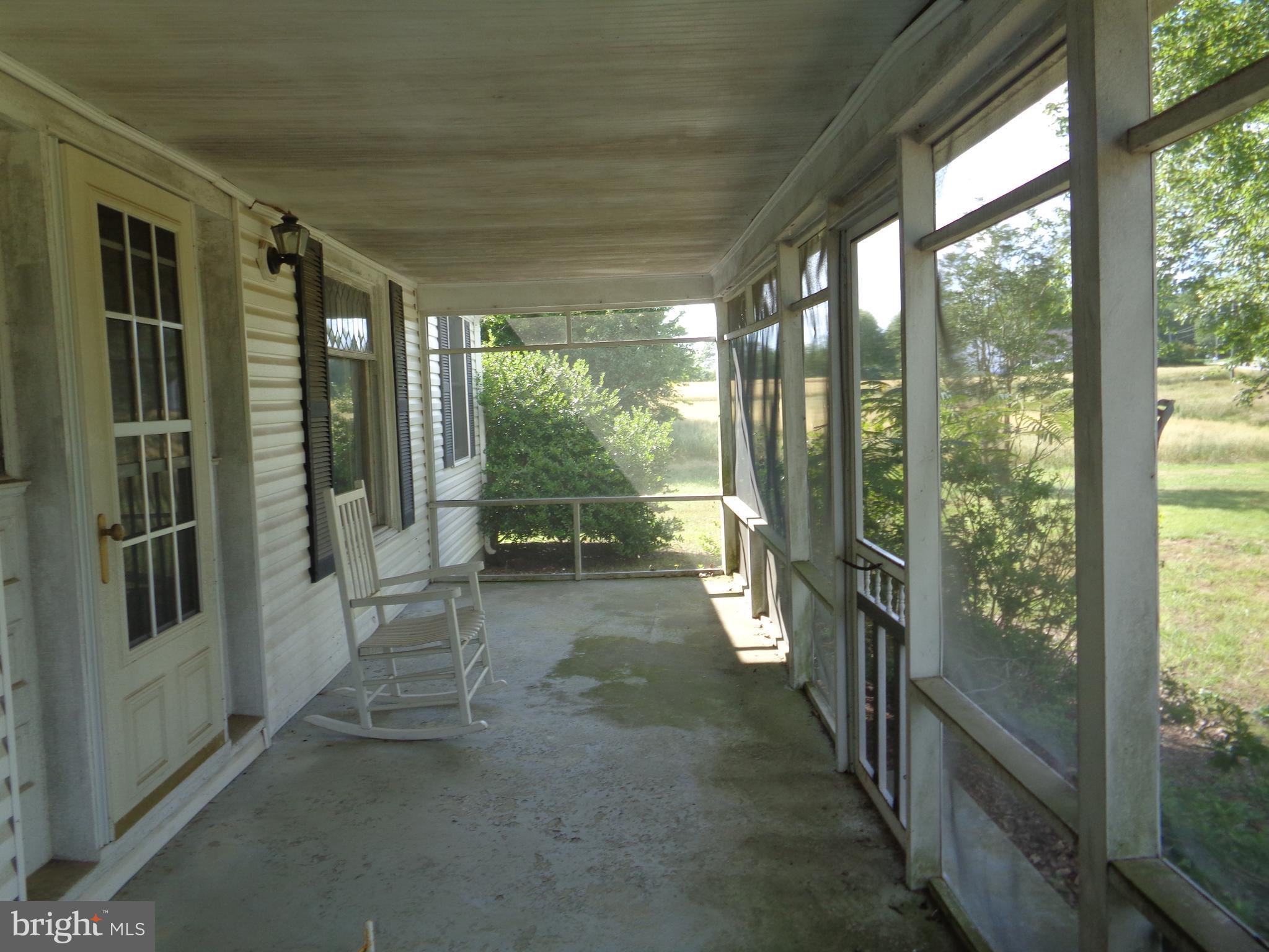 9145 Mackall Road St. Leonard, MD 20685 - Photo 14 of 48 Front screened porch