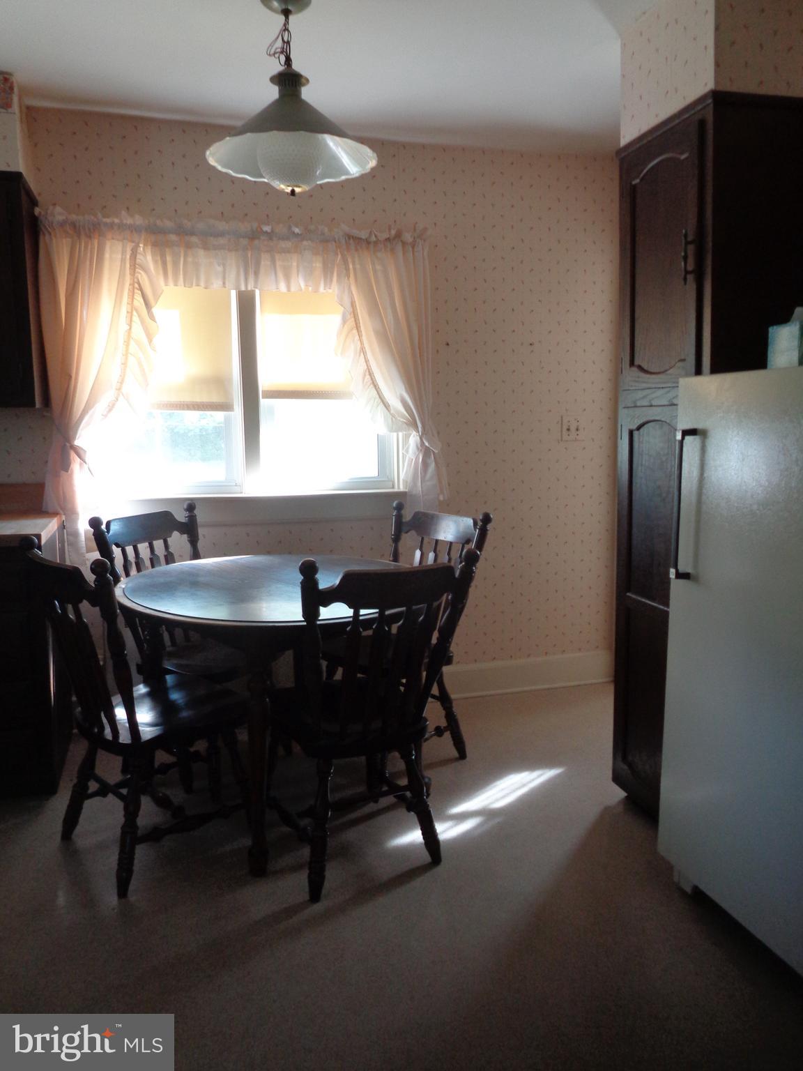 9145 Mackall Road St. Leonard, MD 20685 - Photo 23 of 48 Table space in kitchen