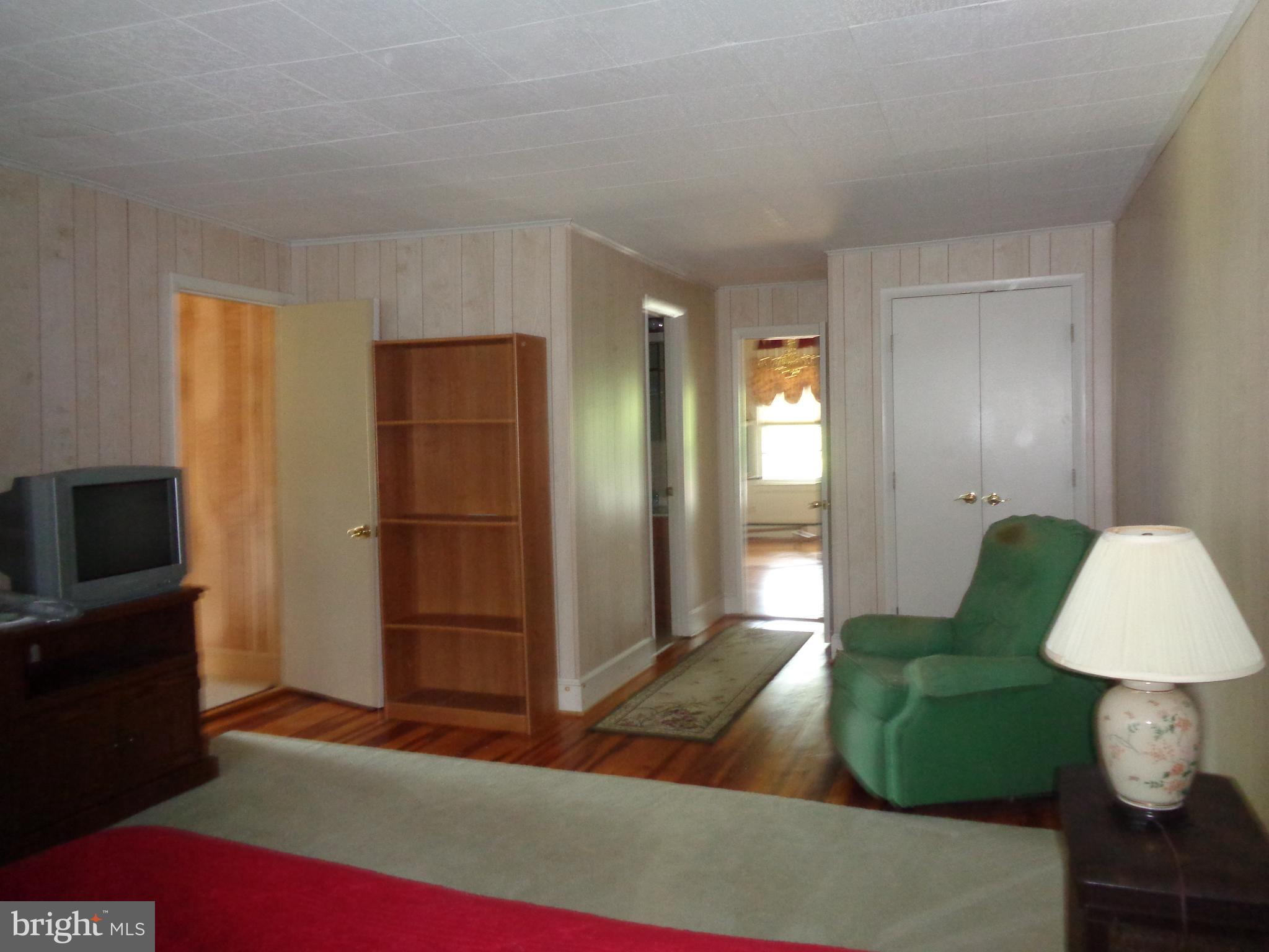 9145 Mackall Road St. Leonard, MD 20685 - Photo 26 of 48 Main level master bedroom