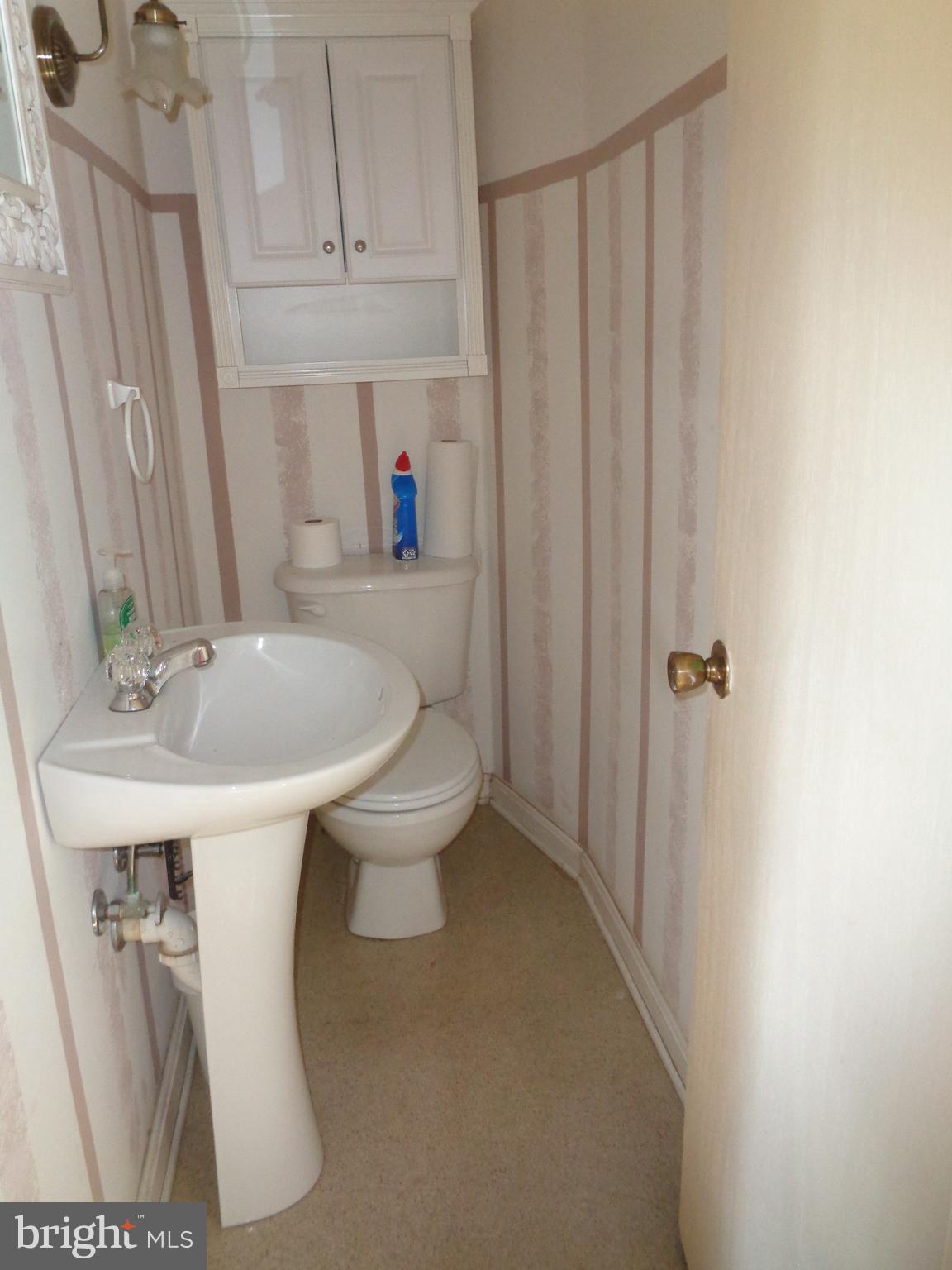9145 Mackall Road St. Leonard, MD 20685 - Photo 32 of 48 Main level powder room