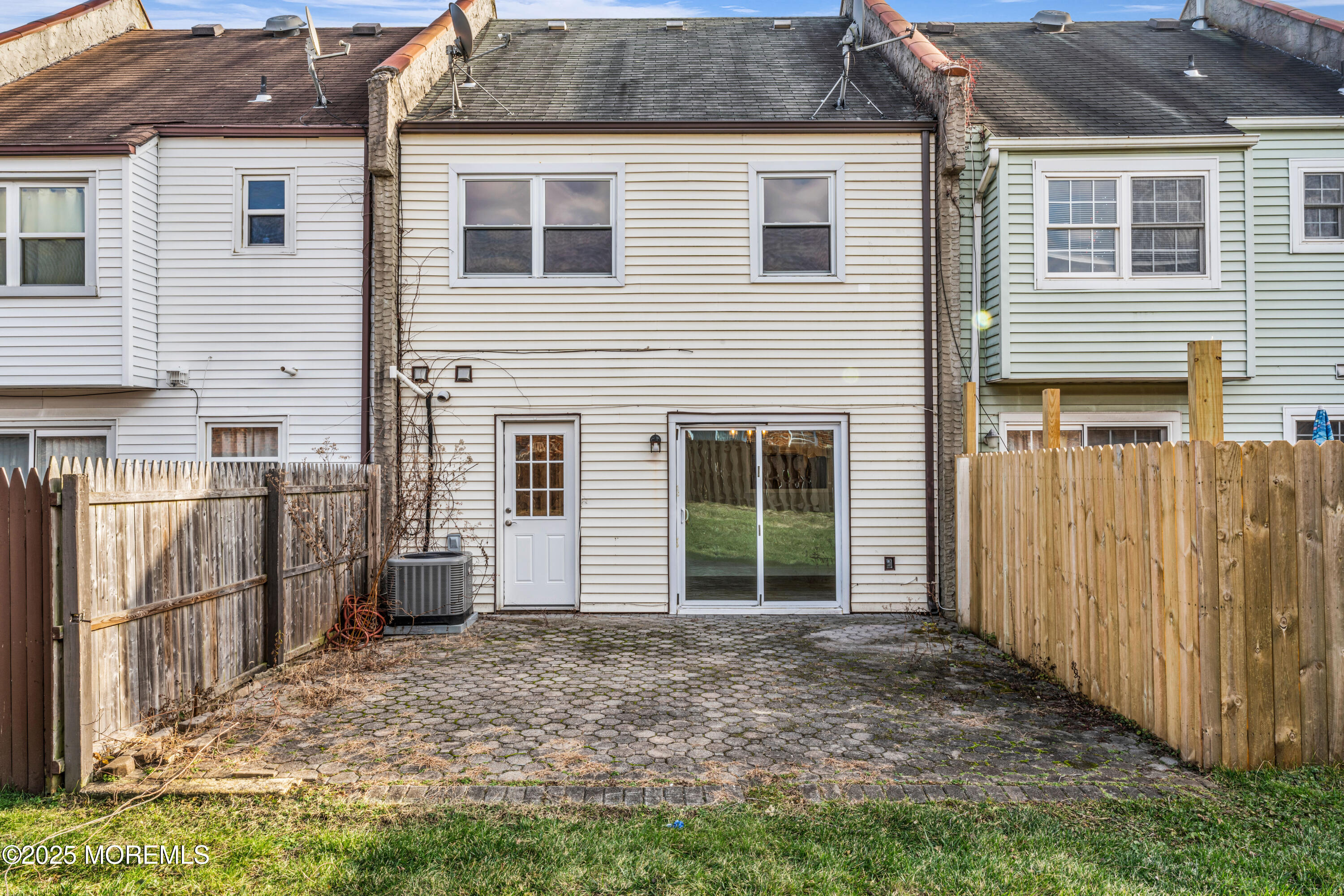 182 Greenwood Loop Road Brick, NJ 08724 - Photo 17 of 19 a view of backyard of house and wooden deck