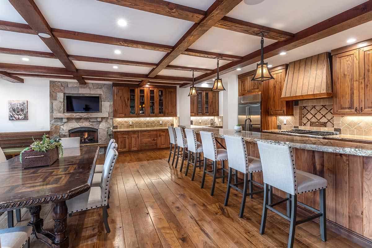 8207 Fallen Leaf Way Truckee, CA 96161 - Photo 13 of 21 a dining room with furniture a window and wooden floor