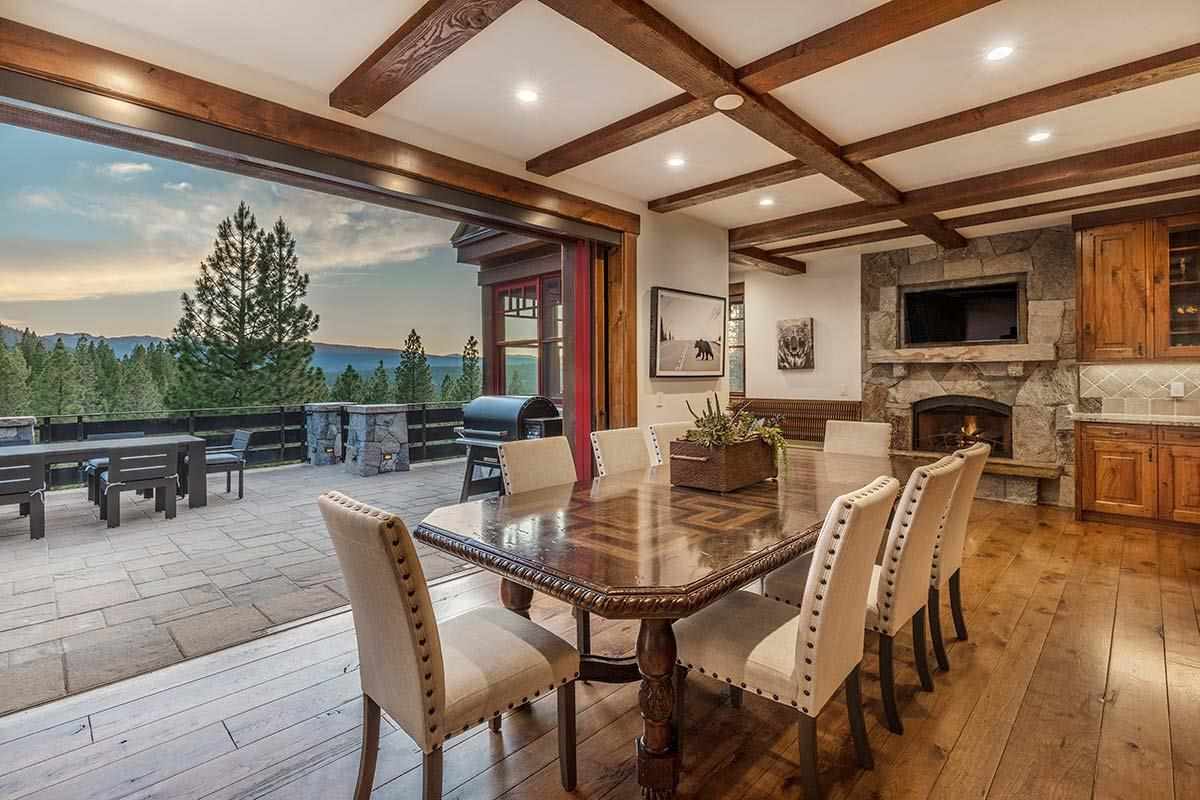 8207 Fallen Leaf Way Truckee, CA 96161 - Photo 14 of 21 a view of a dining room with furniture window and wooden floor