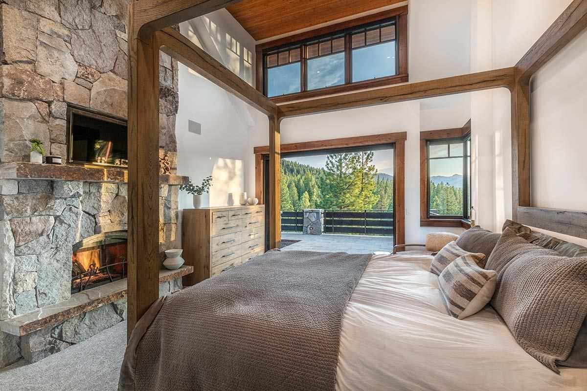 8207 Fallen Leaf Way Truckee, CA 96161 - Photo 16 of 21 a bedroom with a large bed and a large window