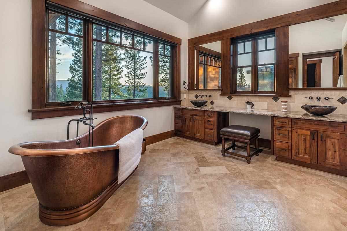 8207 Fallen Leaf Way Truckee, CA 96161 - Photo 17 of 21 a large white kitchen with a large window