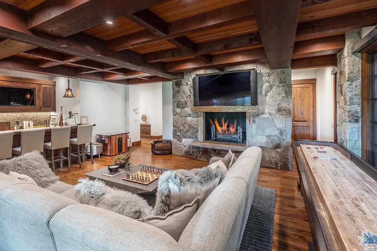 8207 Fallen Leaf Way Truckee, CA 96161 - Photo 18 of 21 a living room with furniture and a flat screen tv