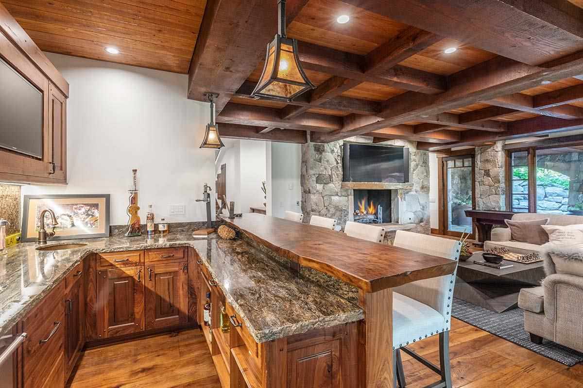 8207 Fallen Leaf Way Truckee, CA 96161 - Photo 19 of 21 a living room with furniture and a fireplace