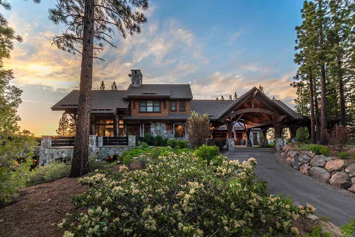 8207 Fallen Leaf Way Truckee, CA 96161 - Photo 3 of 21 a front view of a house with a garden and trees