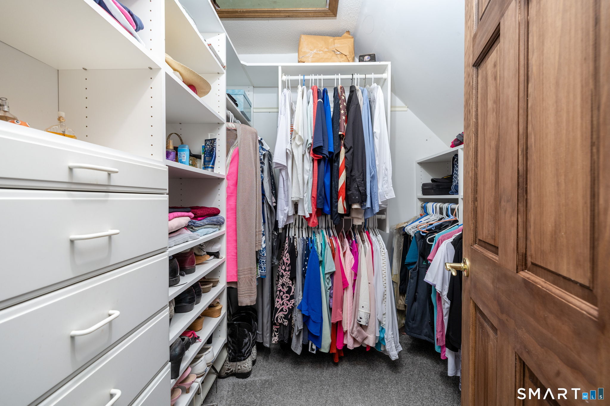 39 Chapman Road Marlborough, CT 06447 - Photo 21 of 40 a view of walk in closet with clothes