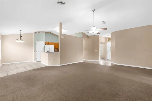 a view of a kitchen with a sink and cabinet area