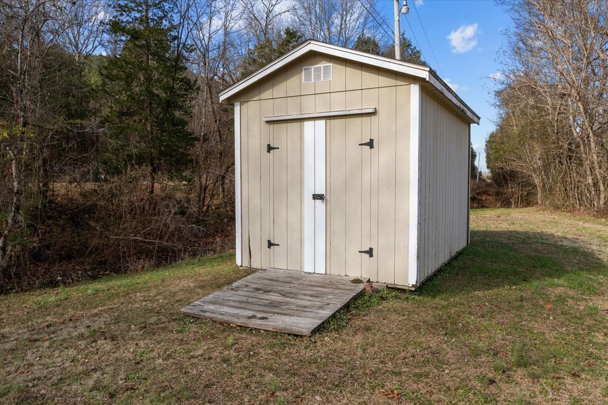 25 Cardinal Road Linden, TN 37096 - Photo 53 of 84 a view of backyard of house