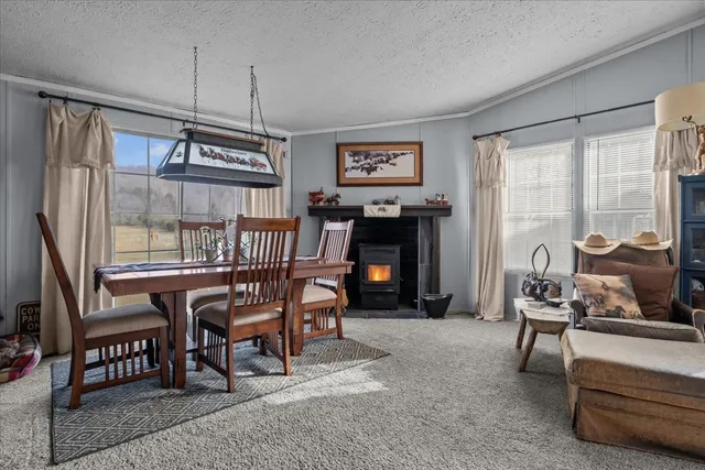a kitchen with stainless steel appliances granite countertop a stove and a refrigerator