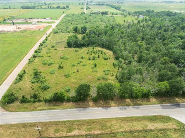 a view of a yard with an outdoor space