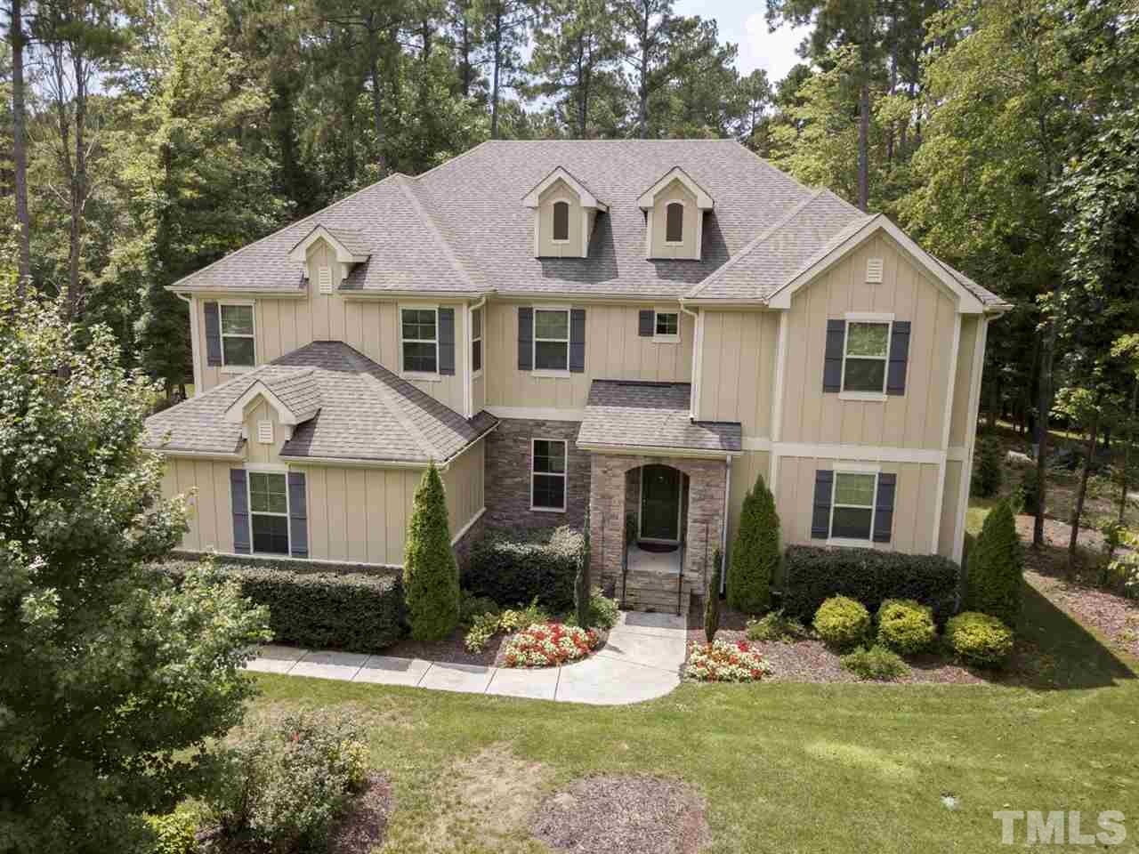 4844 Inwood Road Raleigh, NC 27603 - Photo 22 of 25 a front view of a house with a yard
