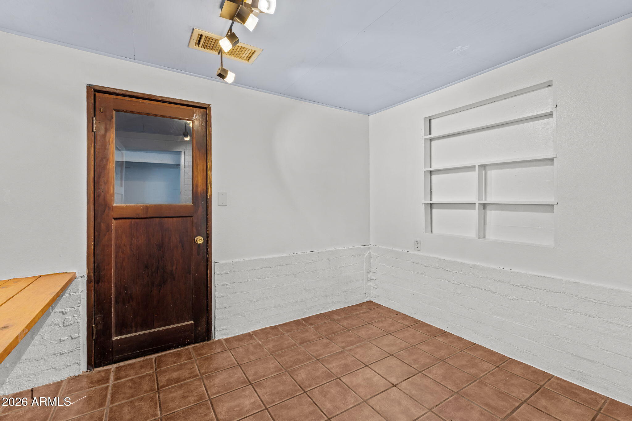 22905 Ranch Road Congress, AZ 85332 - Photo 16 of 26 a view of empty room with wooden floor