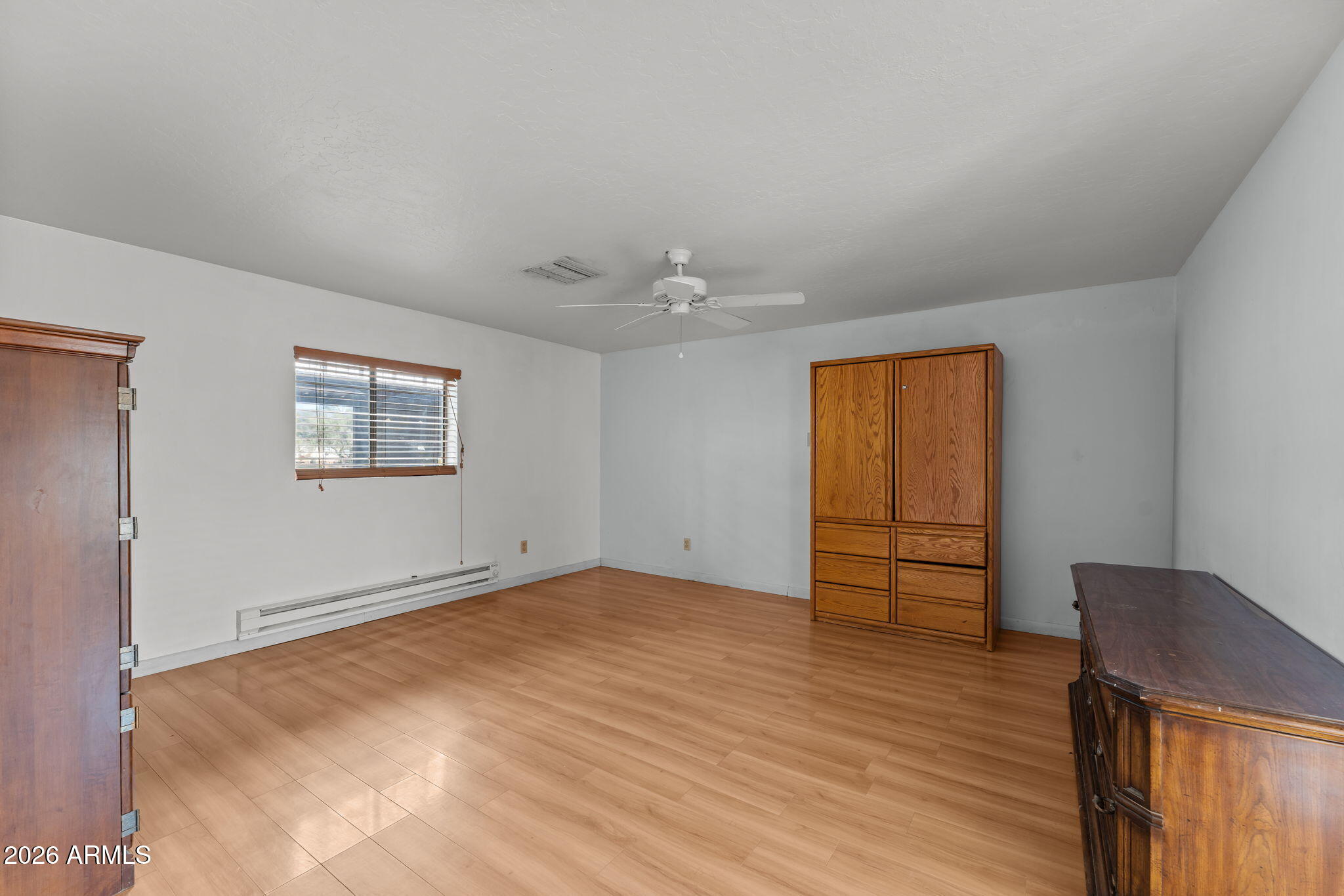 22905 Ranch Road Congress, AZ 85332 - Photo 21 of 26 a view of a livingroom with wooden floor and a window