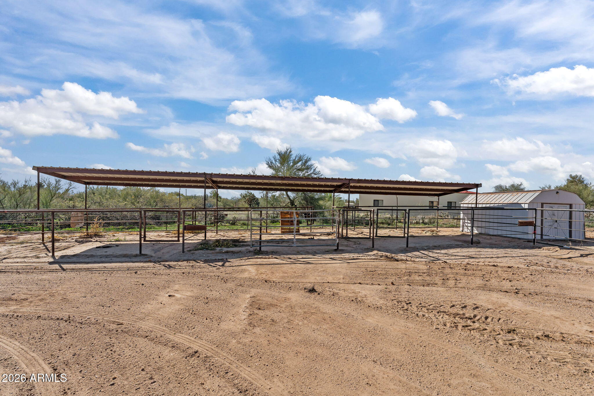 22905 Ranch Road Congress, AZ 85332 - Photo 4 of 26 a view of roof with wooden fence