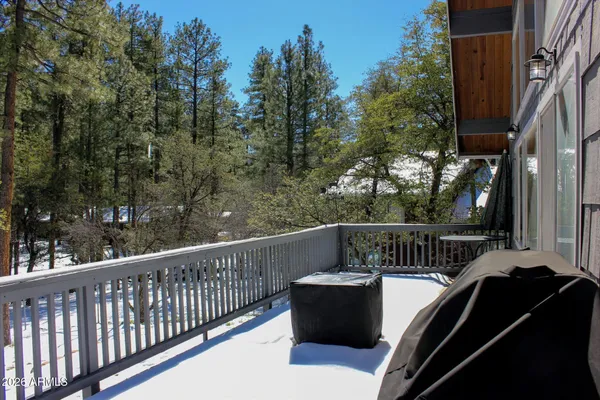 a view of a house covered in snow