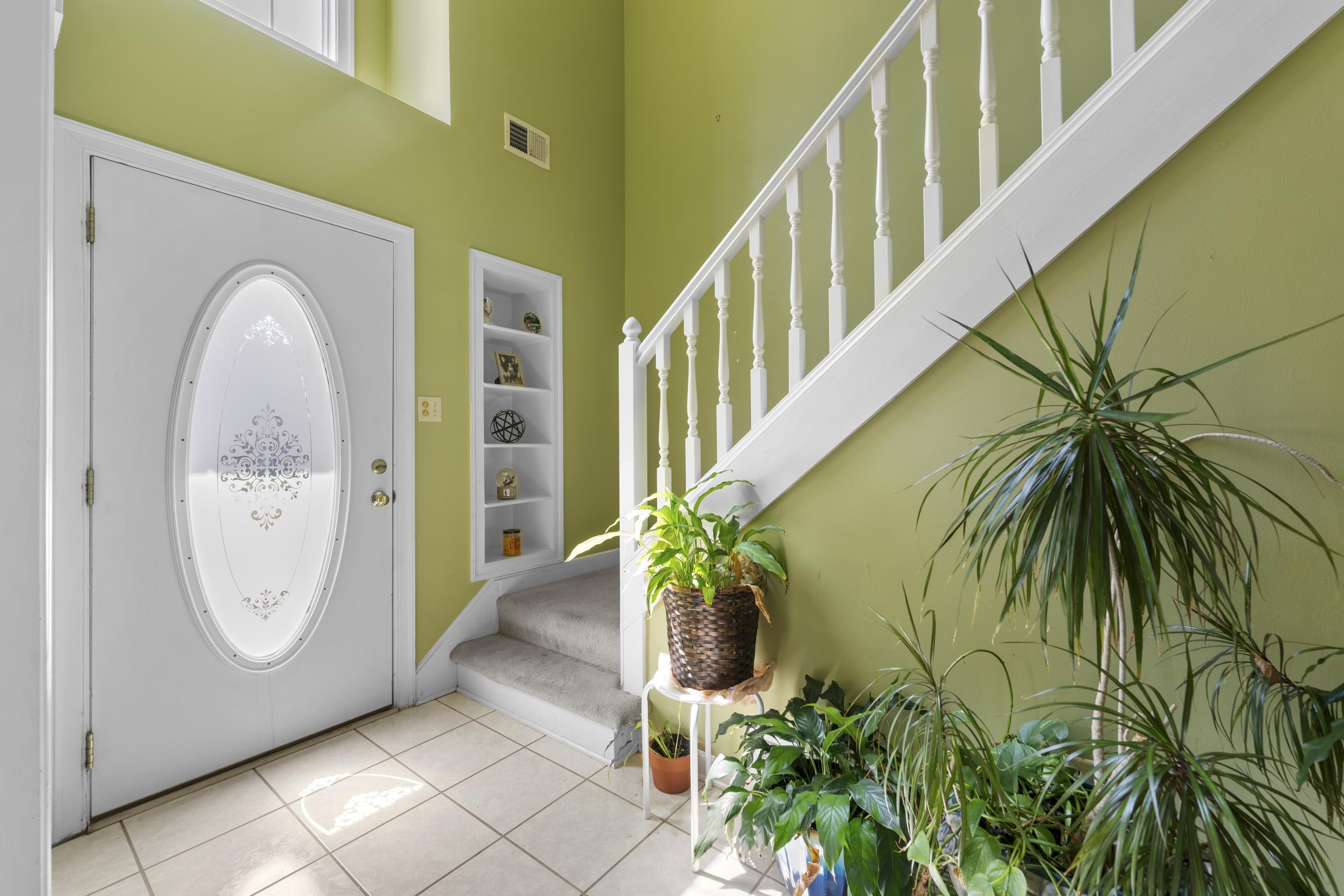 8956 Meadow Ridge Cove East Memphis, TN 38016 - Photo 5 of 28 a view of entryway with garden