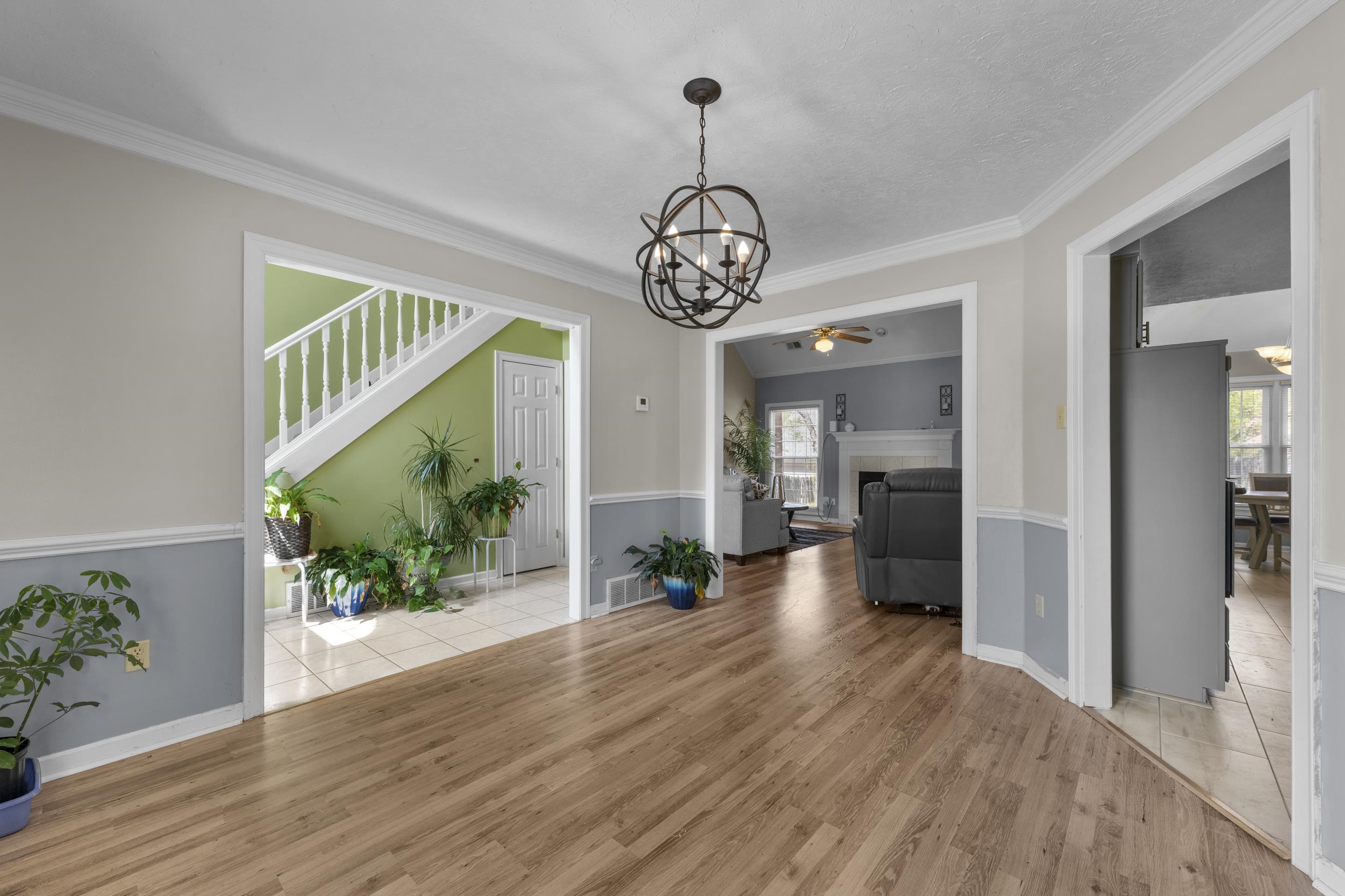 8956 Meadow Ridge Cove East Memphis, TN 38016 - Photo 6 of 28 a view of a living room and hardwood floor