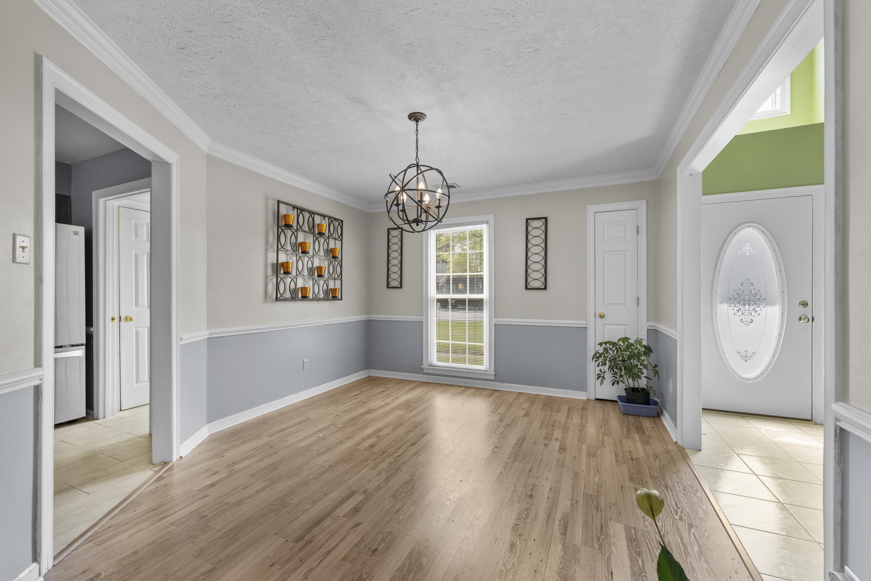 8956 Meadow Ridge Cove East Memphis, TN 38016 - Photo 7 of 28 a view of an entryway with wooden floor