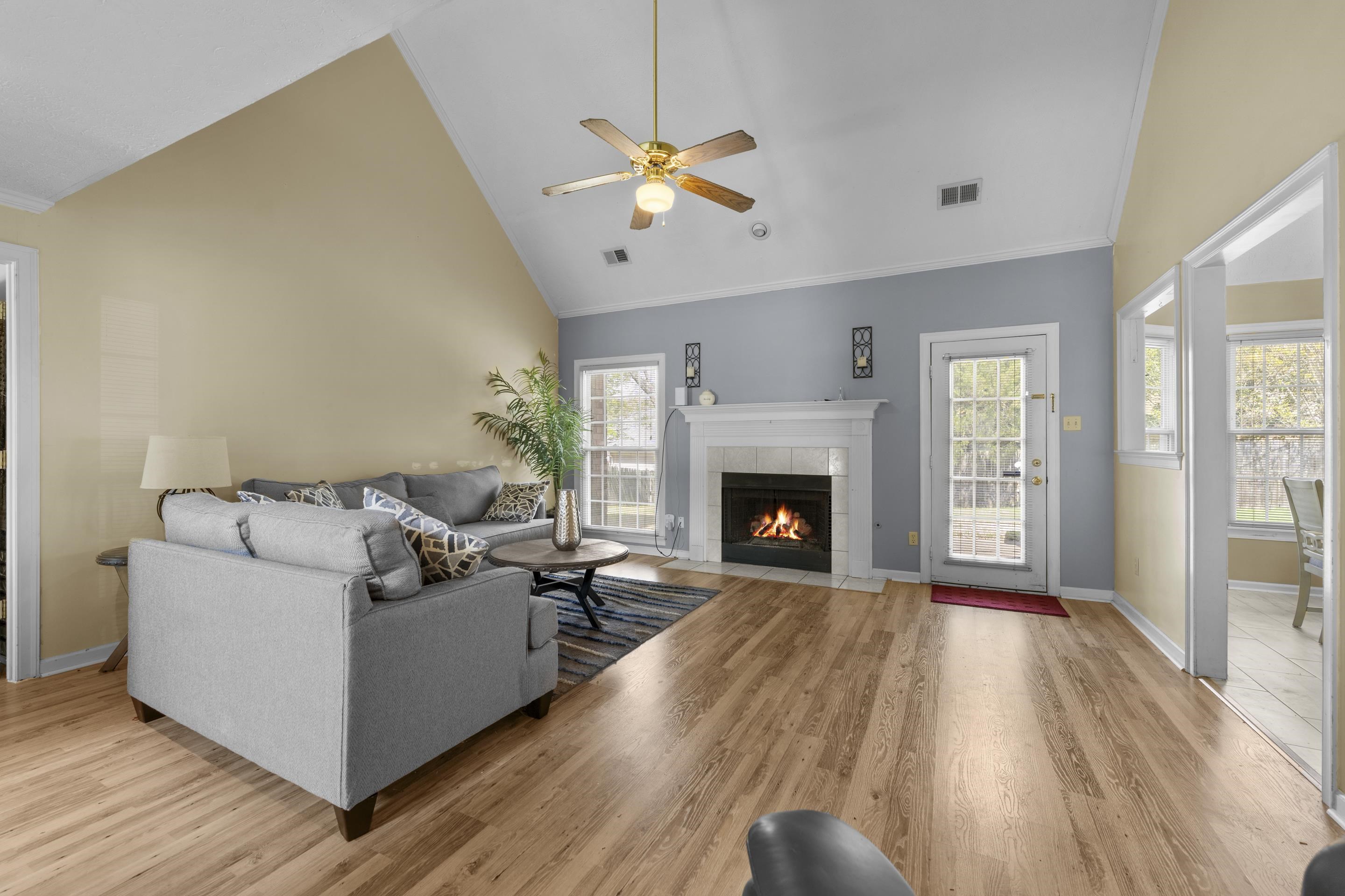 8956 Meadow Ridge Cove East Memphis, TN 38016 - Photo 8 of 28 a living room with furniture and a fireplace