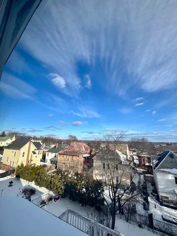 a balcony with a couch