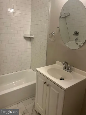 a bathroom with a bathtub
