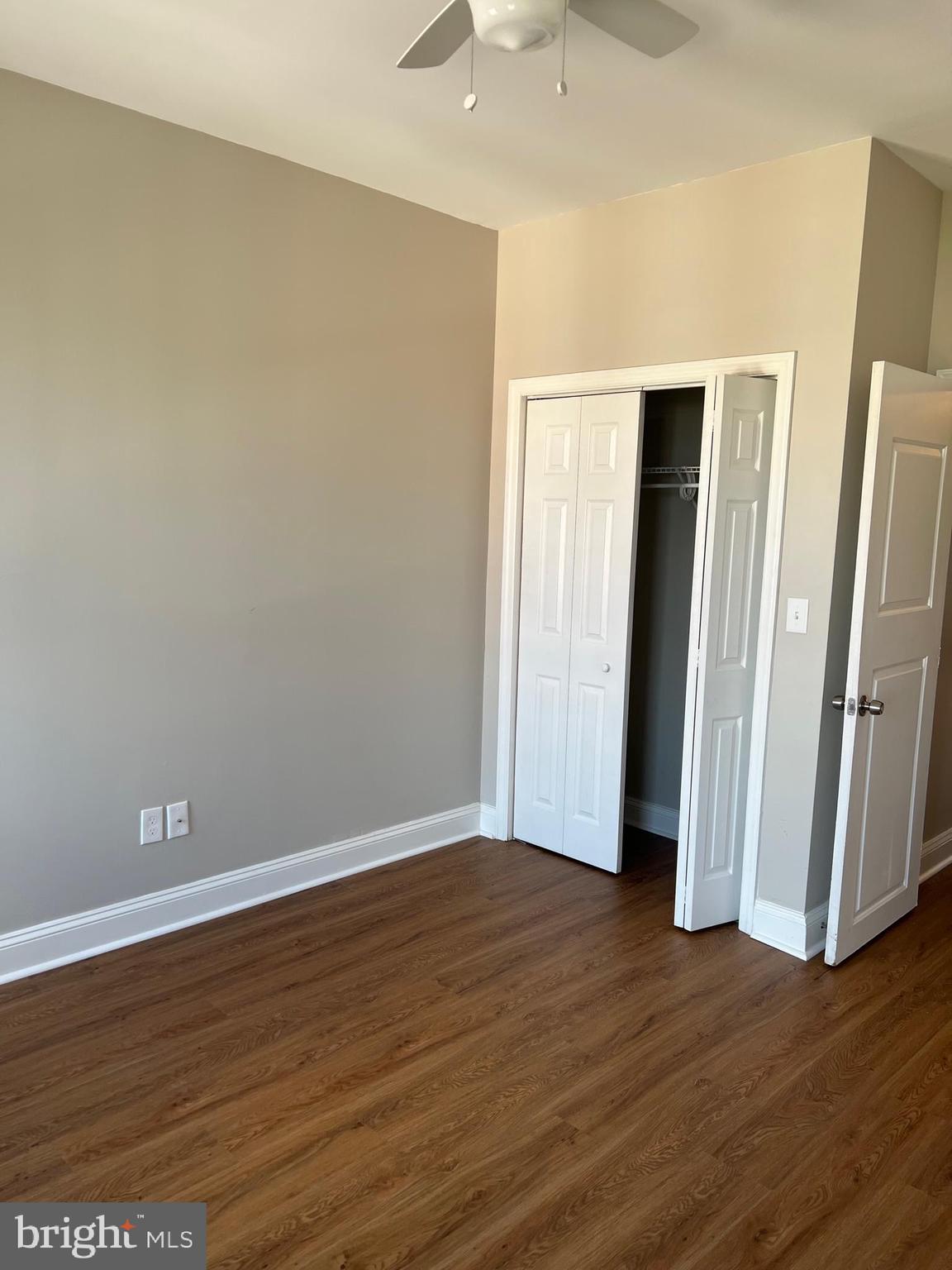 820 North Rose Street Baltimore, MD 21205 - Photo 19 of 20 an empty room with wooden floor and closet