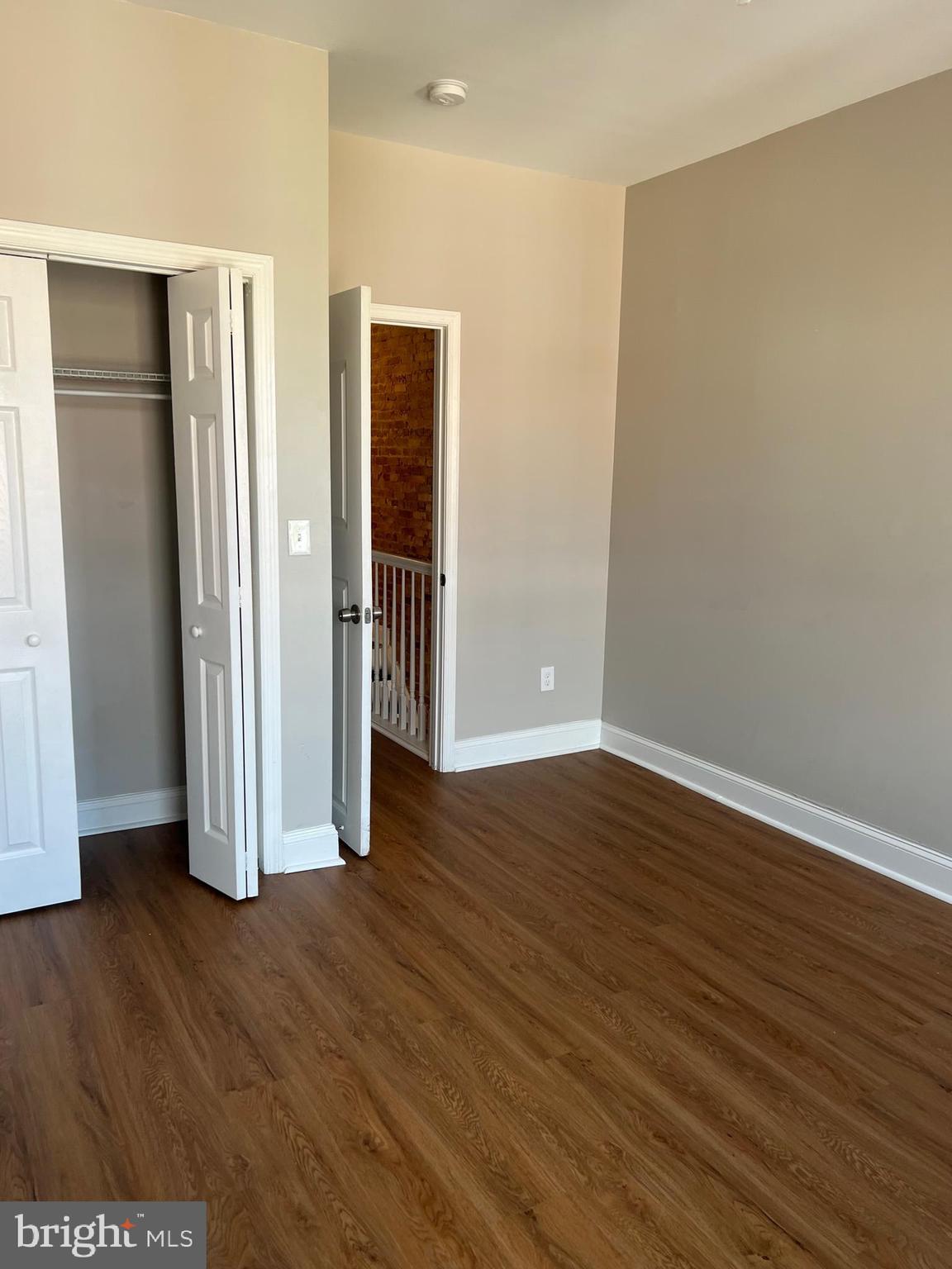 820 North Rose Street Baltimore, MD 21205 - Photo 20 of 20 an empty room with wooden floor and closet