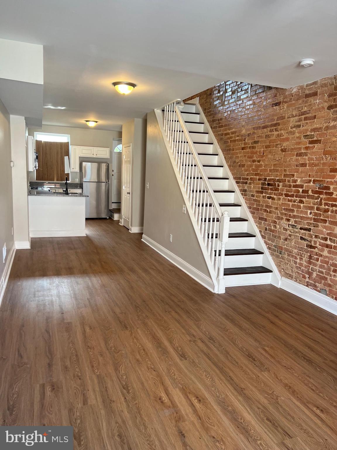 820 North Rose Street Baltimore, MD 21205 - Photo 3 of 20 a view of a room with wooden floor