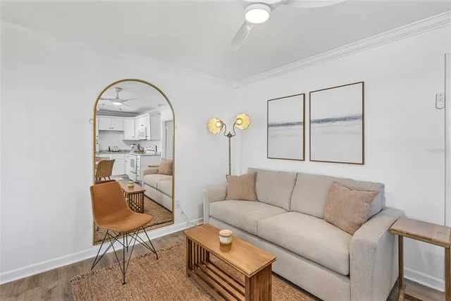 a bedroom with a bed and a mirror