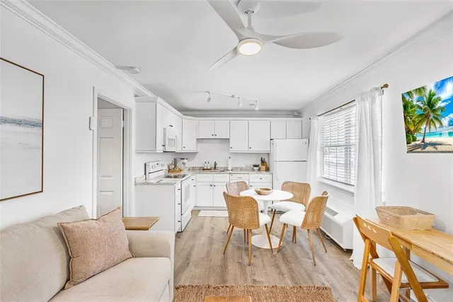 a view of a wooden deck besides a house