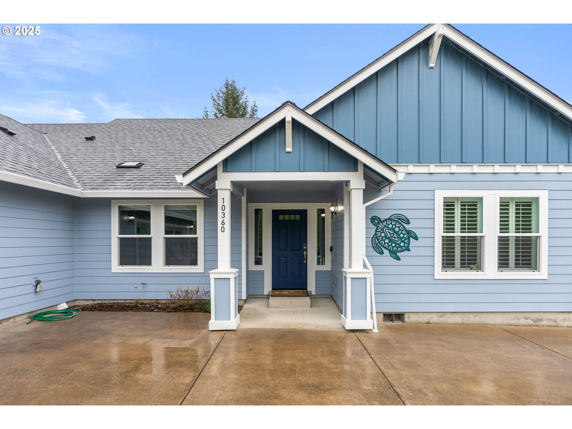 10360 Skyview Road Tillamook, OR 97141 - Photo 1 of 47 a view of a house with wooden floor and a yard