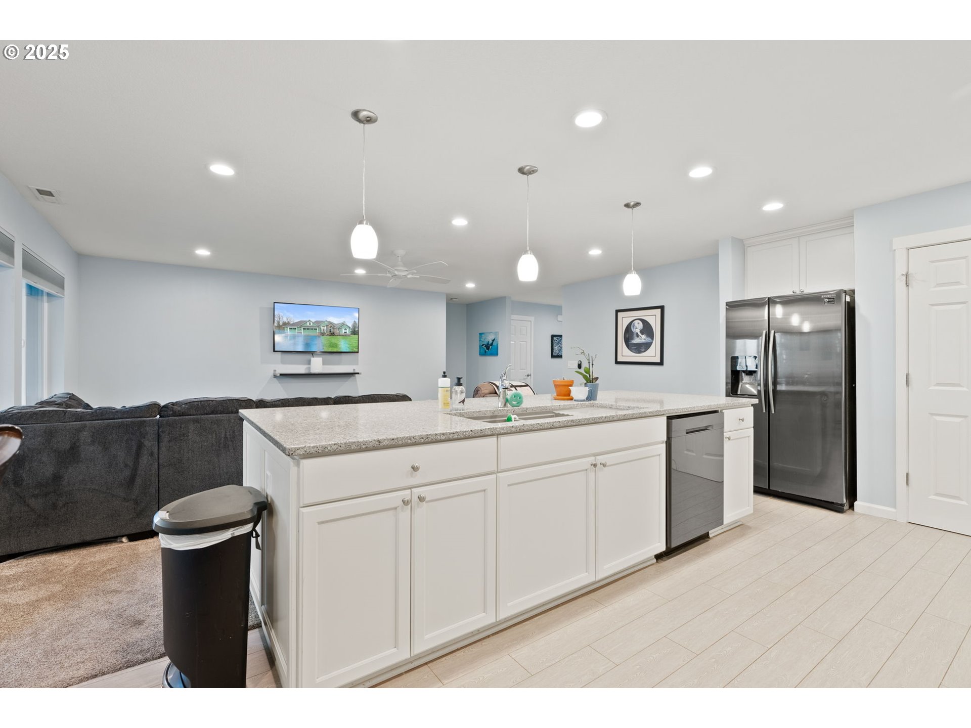 10360 Skyview Road Tillamook, OR 97141 - Photo 15 of 47 a kitchen with stainless steel appliances kitchen island hardwood floor sink and stove