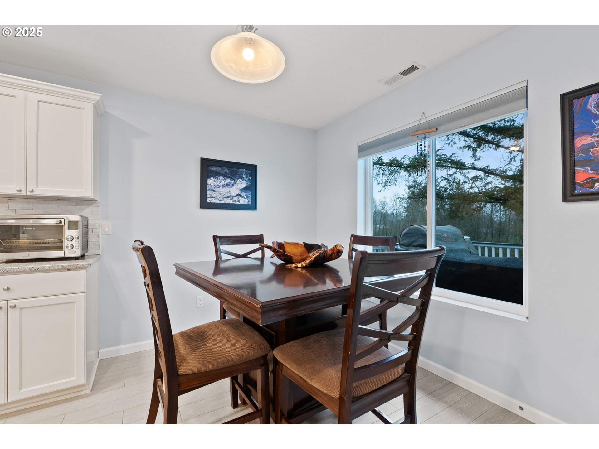 10360 Skyview Road Tillamook, OR 97141 - Photo 18 of 47 a view of a dining room with tables and chairs