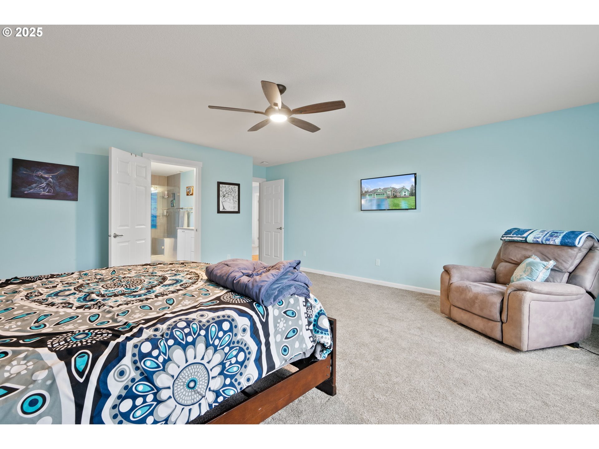10360 Skyview Road Tillamook, OR 97141 - Photo 21 of 47 a bedroom with a bed couch and window