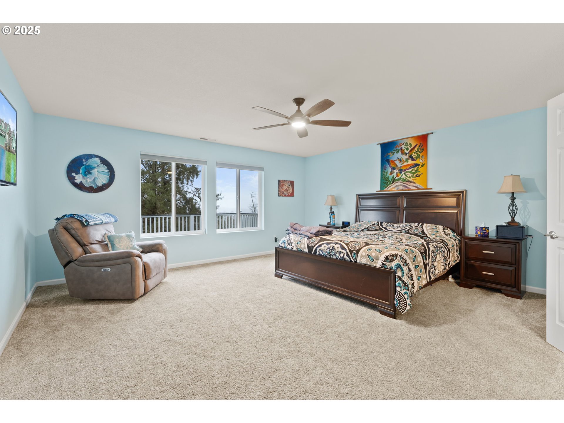 10360 Skyview Road Tillamook, OR 97141 - Photo 22 of 47 a bedroom with a bed and a large window