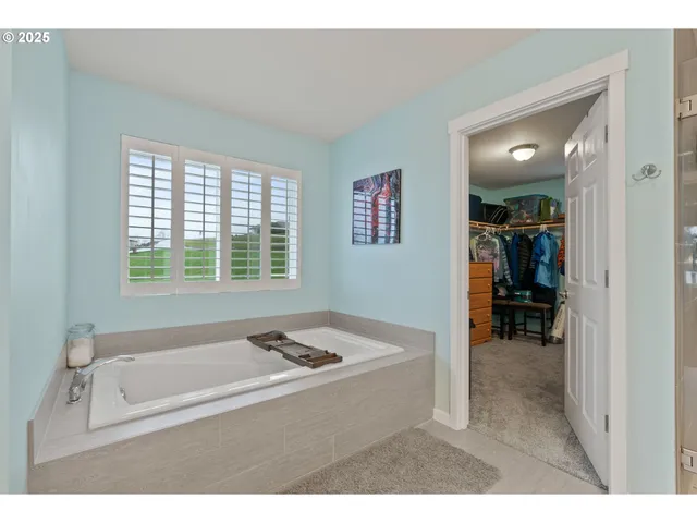 a bathroom with a sink and a bathtub