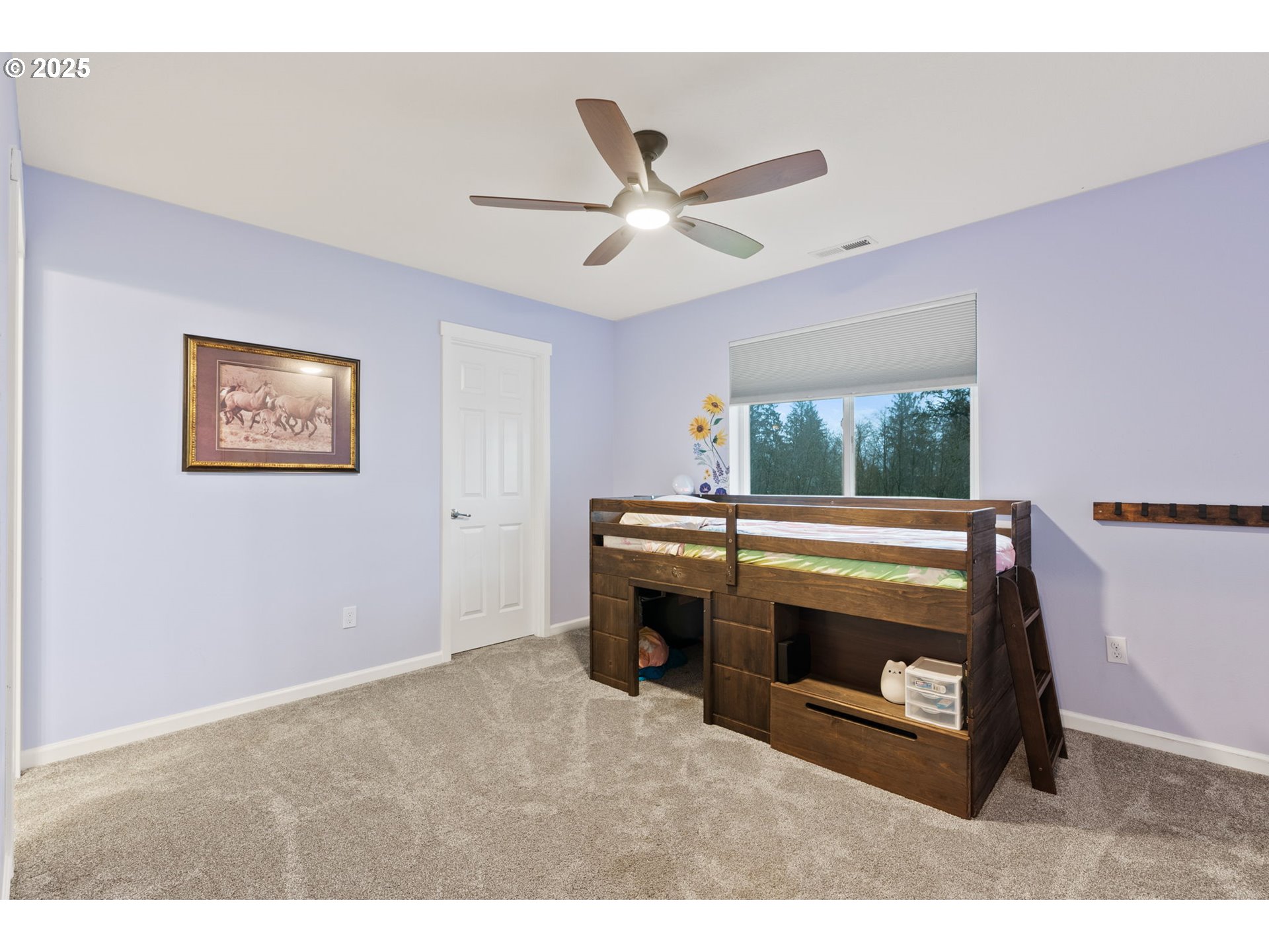 10360 Skyview Road Tillamook, OR 97141 - Photo 29 of 47 a living room with furniture and a fireplace