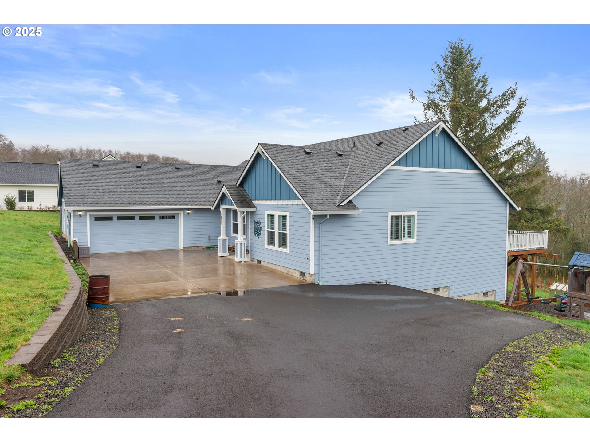 10360 Skyview Road Tillamook, OR 97141 - Photo 3 of 47 a house with trees in the background