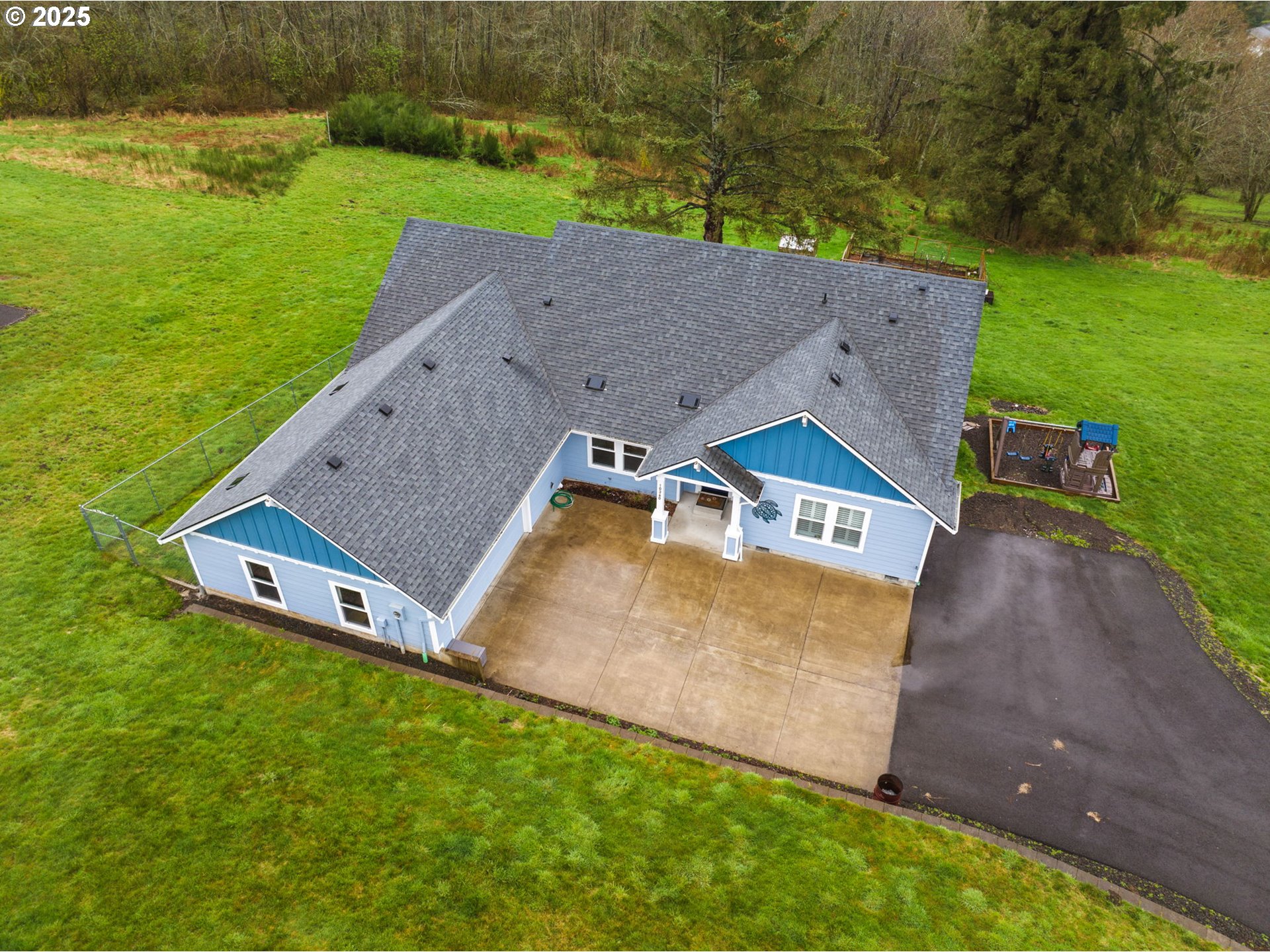 10360 Skyview Road Tillamook, OR 97141 - Photo 43 of 47 an aerial view of a house with a yard