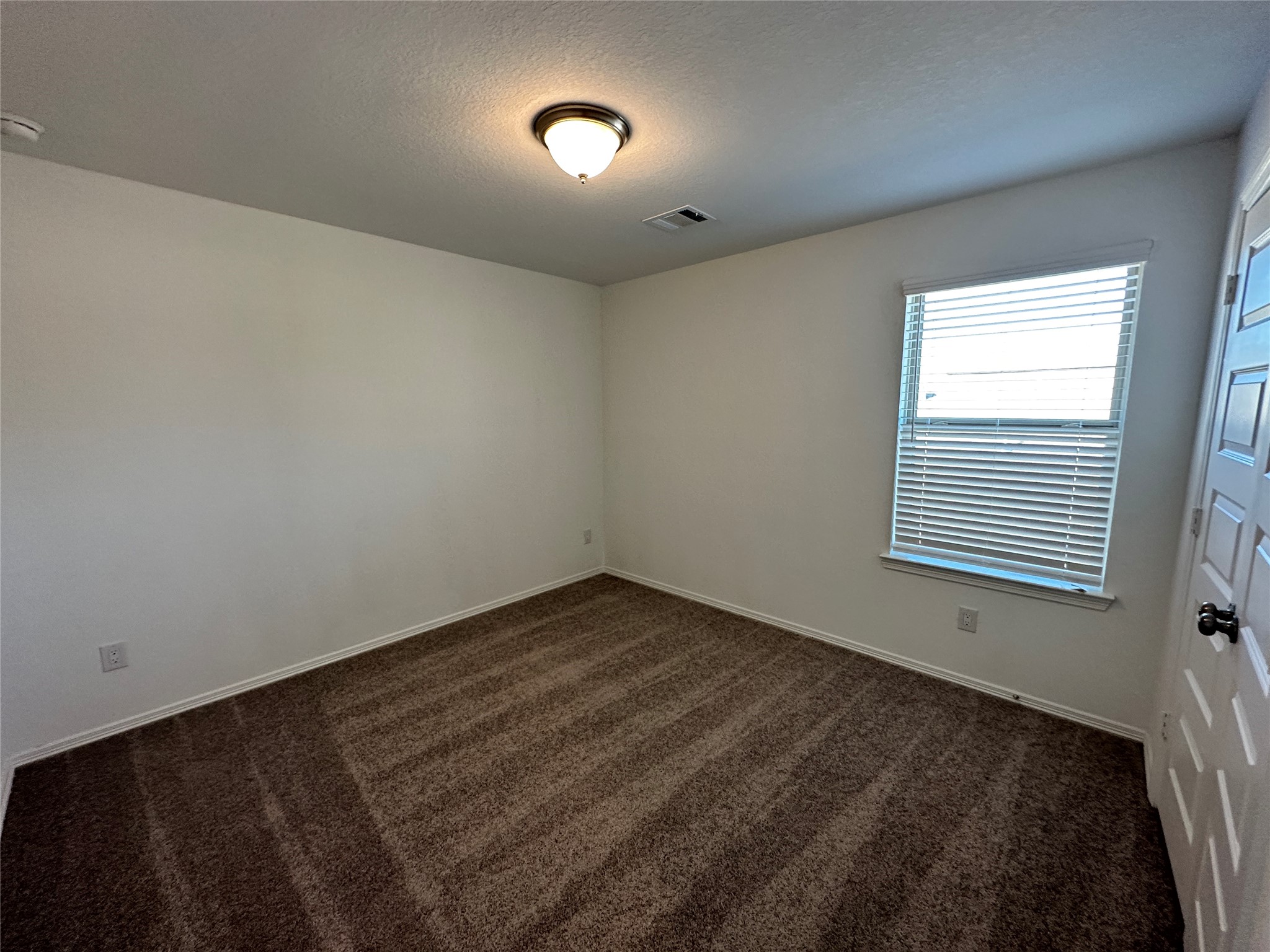 16622 Moss Lane Porter, TX 77365 - Photo 11 of 18 a view of an empty room with a window