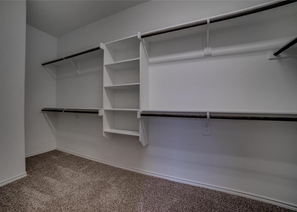 2408 Windhaven Drive Denton, TX 76210 - Photo 9 of 13 a view of an empty walk in closet