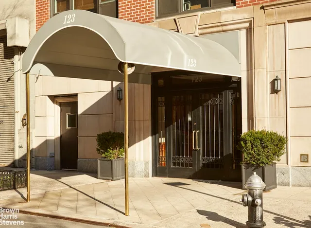 a bathroom with a sink a toilet a mirror and vanity