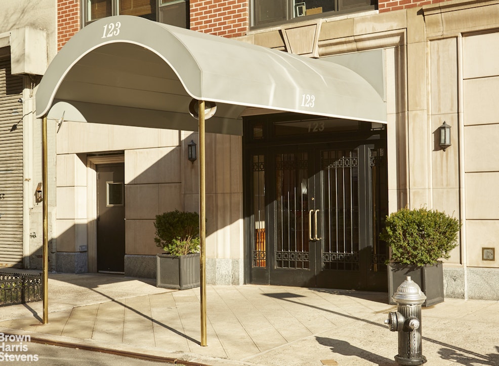 123 East 75th Street, Unit 6A Manhattan, NY 10021 - Photo 4 of 5 a couple of potted plants in front of door