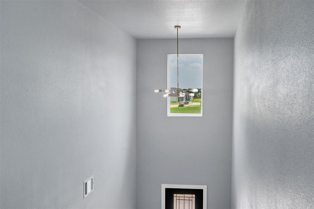 588 Highview Court Godley, TX 76044 - Photo 19 of 38 a view of an entryway with window